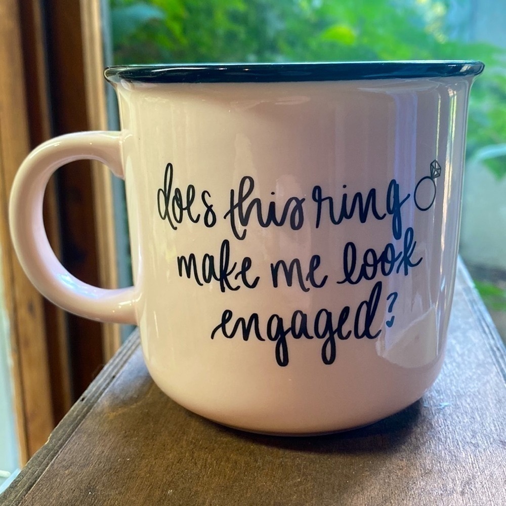 DOES this ring make me look engaged? Mug